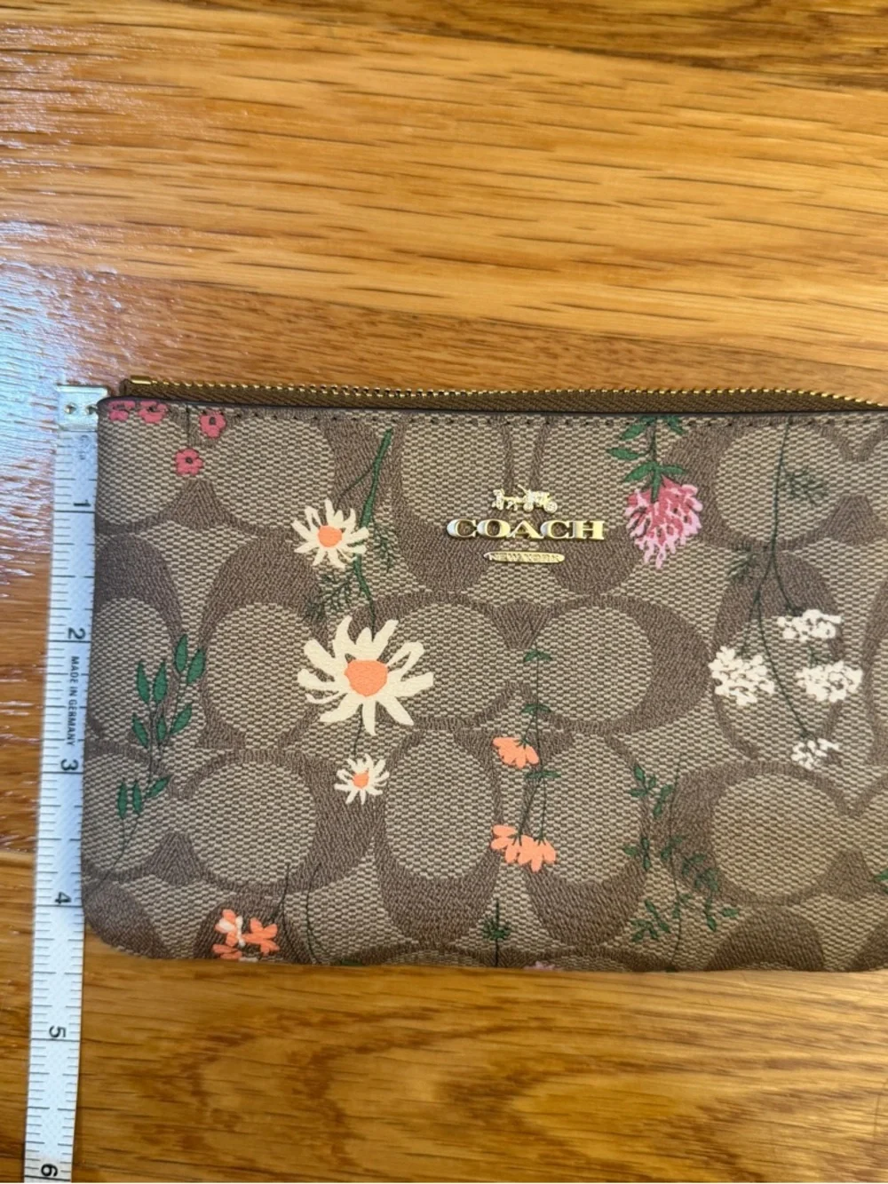 Coach Corner Zip Wristlet In Signature Canvas With Wildflower Print
